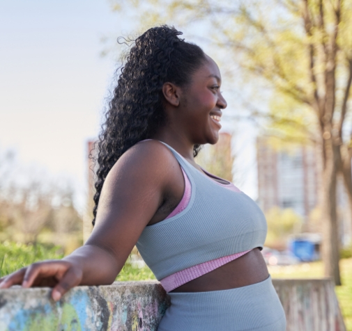 Black woman smiling outside